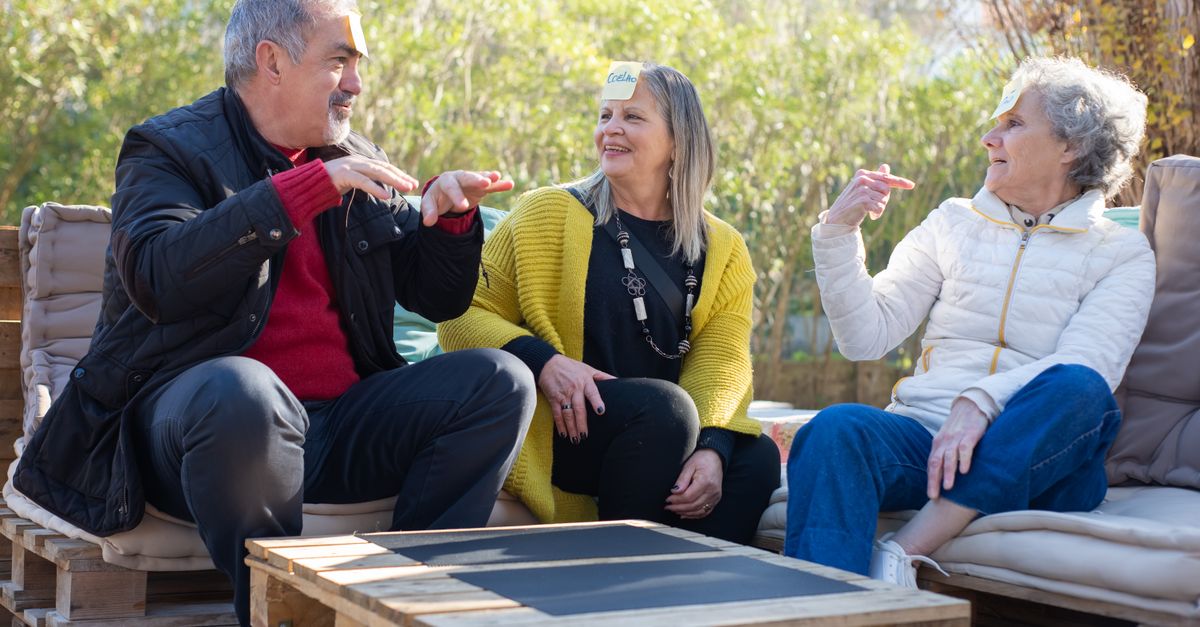 Older adults enjoying social time together in a residential setting